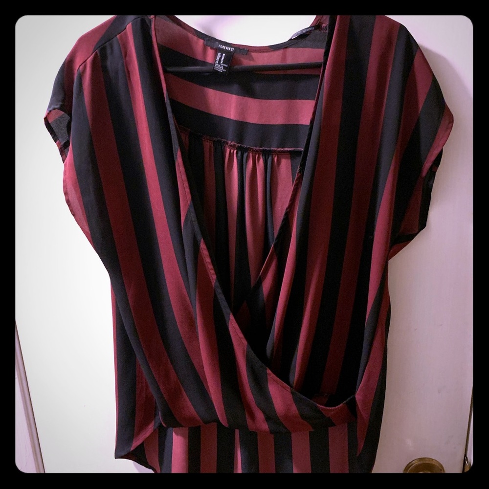 Red and black high low blouse